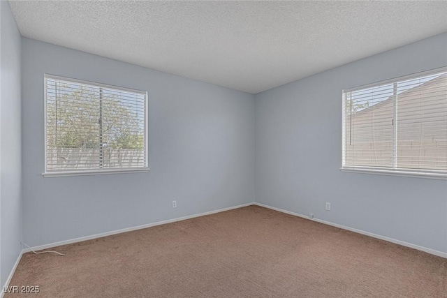 4784 El Escorial Dr, Las Vegas, NV 89121 - carpeted empty room with a textured ceiling and baseboards