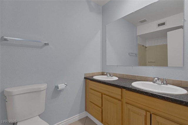 4784 El Escorial Dr, Las Vegas, NV 89121 - bathroom with double vanity and toilet
