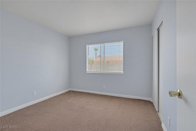 4784 El Escorial Dr, Las Vegas, NV 89121 - carpeted empty room featuring baseboards