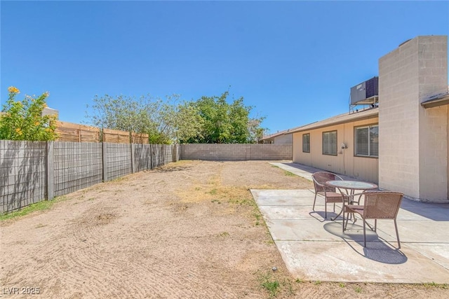 4784 El Escorial Dr, Las Vegas, NV 89121 - fenced backyard featuring a patio area