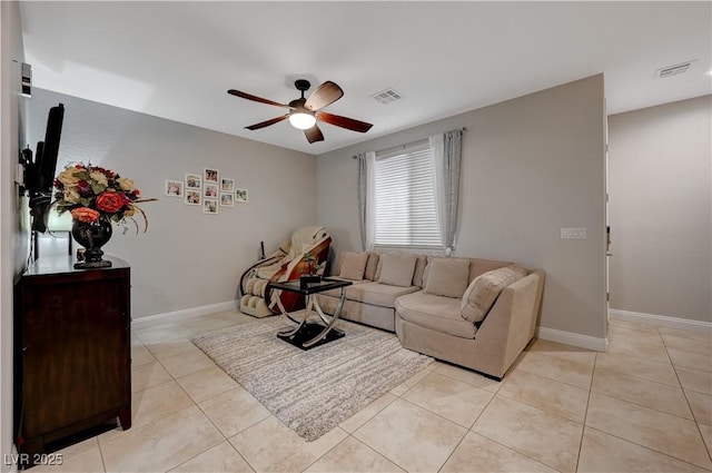 7311 Spring Flower Ave, Las Vegas, NV 89117 - living room featuring ceiling fan and light tile patterned floors