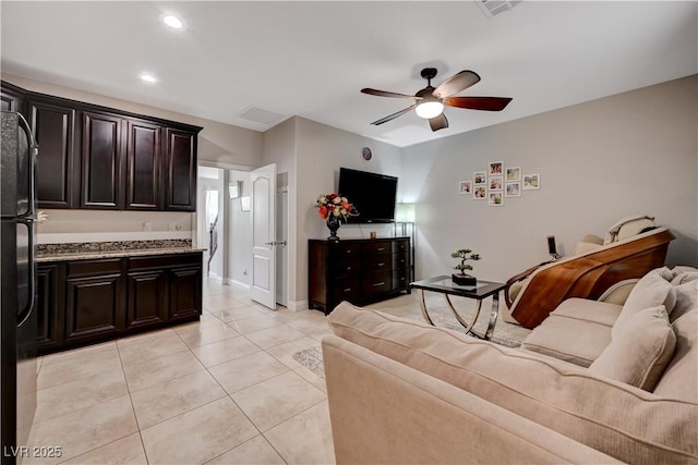 7311 Spring Flower Ave, Las Vegas, NV 89117 - living room featuring ceiling fan, light tile patterned flooring, and recessed lighting