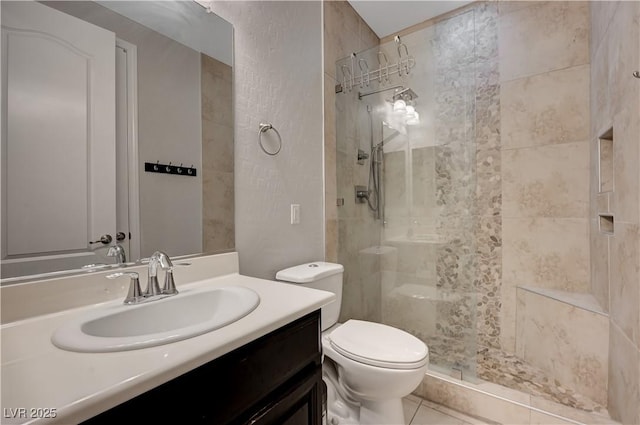 7311 Spring Flower Ave, Las Vegas, NV 89117 - full bath featuring vanity, tiled shower, and tile patterned flooring