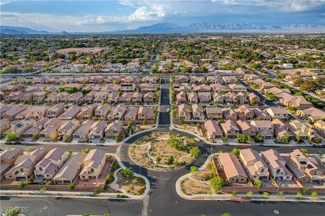 7311 Spring Flower Ave, Las Vegas, NV 89117 - aerial view of property and surrounding area featuring a mountain backdrop and nearby suburban area