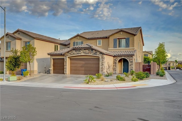 7311 Spring Flower Ave, Las Vegas, NV 89117 - mediterranean / spanish-style house featuring a garage, stone siding, stucco siding, and a tile roof