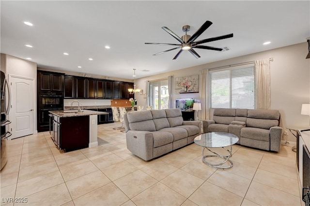 7311 Spring Flower Ave, Las Vegas, NV 89117 - living area with a ceiling fan, recessed lighting, and light tile patterned flooring