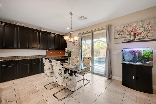 7311 Spring Flower Ave, Las Vegas, NV 89117 - dining area with a chandelier and light tile patterned floors