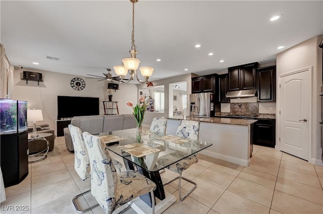 7311 Spring Flower Ave, Las Vegas, NV 89117 - dining room with light tile patterned floors, a chandelier, recessed lighting, and ceiling fan