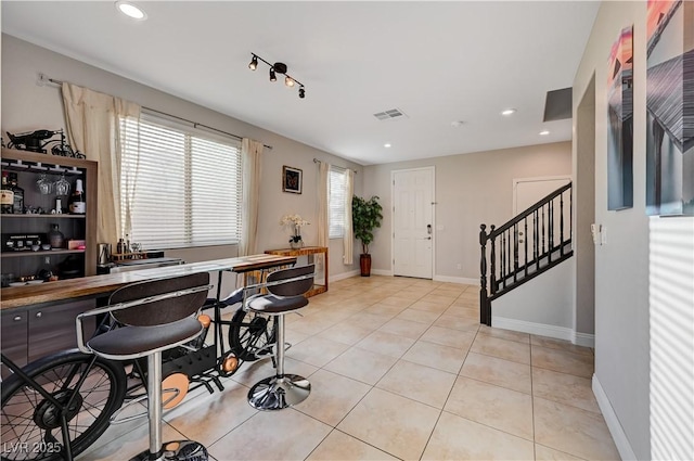 7311 Spring Flower Ave, Las Vegas, NV 89117 - bar featuring stairs, light tile patterned floors, and recessed lighting