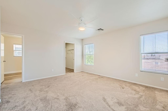 4118 Beech Family St, Las Vegas, NV 89115 - carpeted empty room with a ceiling fan and baseboards