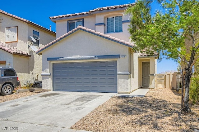 4118 Beech Family St, Las Vegas, NV 89115 - mediterranean / spanish-style home with driveway, a garage, stucco siding, a gate, and a tile roof