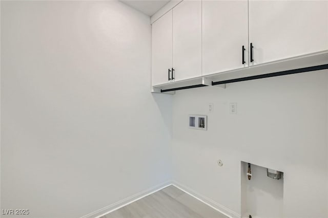 5804 Gossamer Stone Ct, Las Vegas, NV 89141 - laundry area featuring cabinet space, washer hookup, and gas dryer hookup
