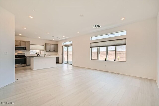 5804 Gossamer Stone Ct, Las Vegas, NV 89141 - unfurnished living room featuring recessed lighting