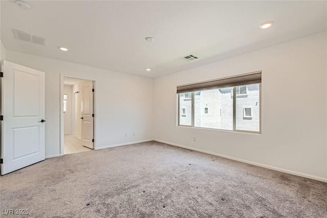 5804 Gossamer Stone Ct, Las Vegas, NV 89141 - empty room featuring light carpet, recessed lighting, and a smoke detector