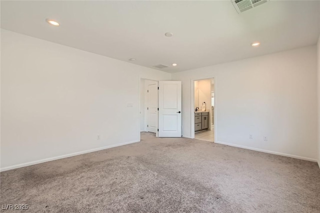 5804 Gossamer Stone Ct, Las Vegas, NV 89141 - spare room with light carpet and recessed lighting