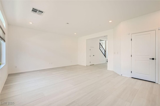 5804 Gossamer Stone Ct, Las Vegas, NV 89141 - spare room with light wood-style floors and recessed lighting