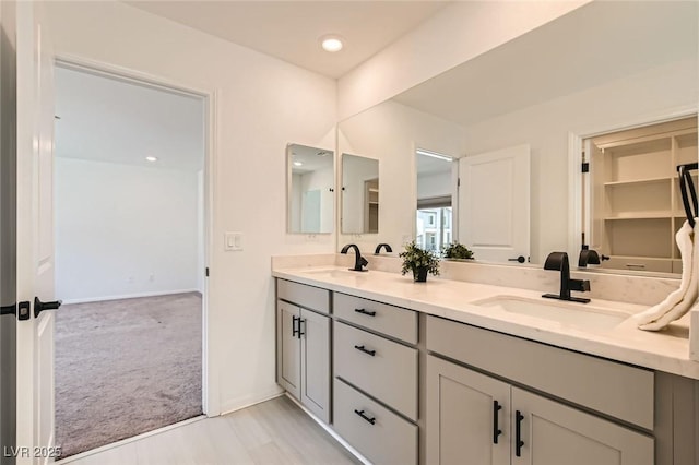 5804 Gossamer Stone Ct, Las Vegas, NV 89141 - full bathroom with double vanity and wood finished floors