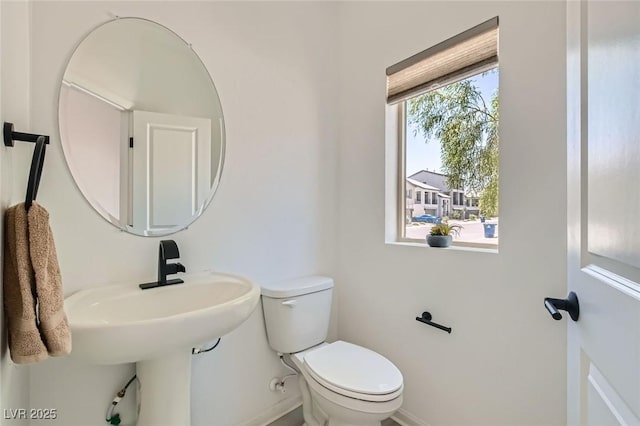 5804 Gossamer Stone Ct, Las Vegas, NV 89141 - half bathroom with baseboards and toilet