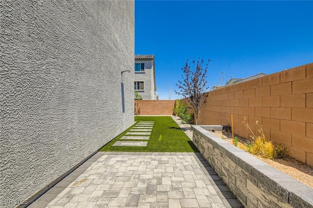 5804 Gossamer Stone Ct, Las Vegas, NV 89141 - fenced backyard featuring a patio