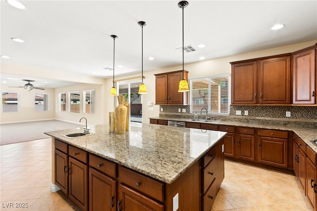 2755 Asgard Ave, Las Vegas, NV 89121 - kitchen featuring a kitchen island, decorative backsplash, light tile patterned floors, ceiling fan, and recessed lighting