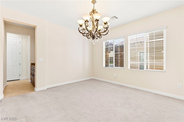 2755 Asgard Ave, Las Vegas, NV 89121 - unfurnished room featuring a chandelier and light carpet