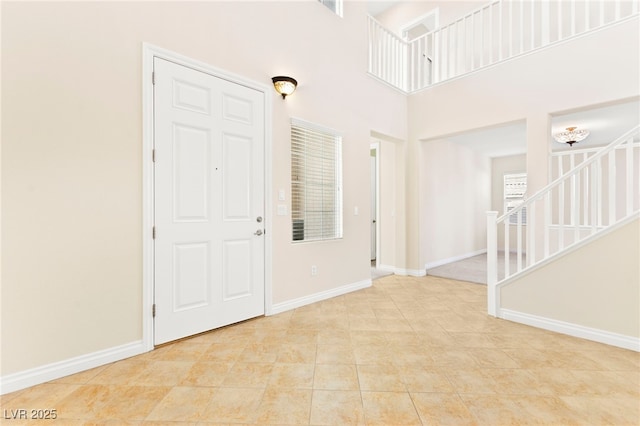 2755 Asgard Ave, Las Vegas, NV 89121 - entrance foyer featuring baseboards and a towering ceiling