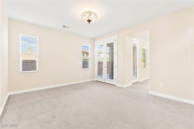 2755 Asgard Ave, Las Vegas, NV 89121 - empty room featuring carpet floors and healthy amount of natural light