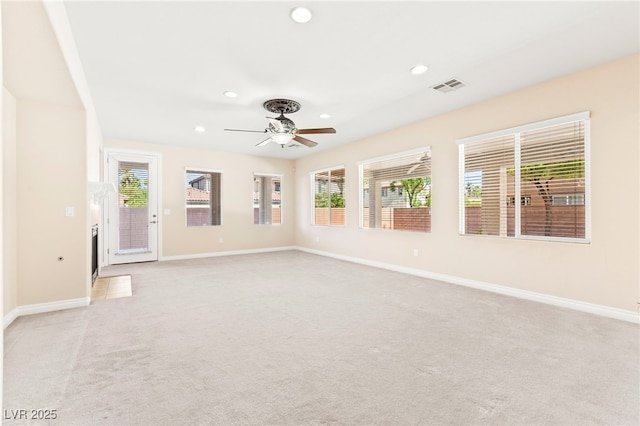 2755 Asgard Ave, Las Vegas, NV 89121 - spare room featuring recessed lighting, ceiling fan, plenty of natural light, and light carpet