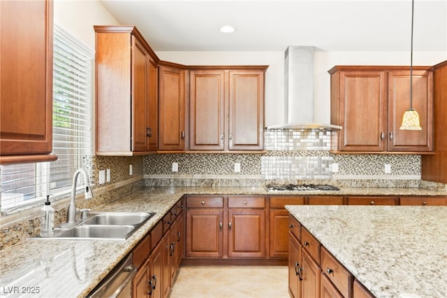 2755 Asgard Ave, Las Vegas, NV 89121 - kitchen featuring wall chimney range hood, appliances with stainless steel finishes, decorative backsplash, brown cabinets, and recessed lighting