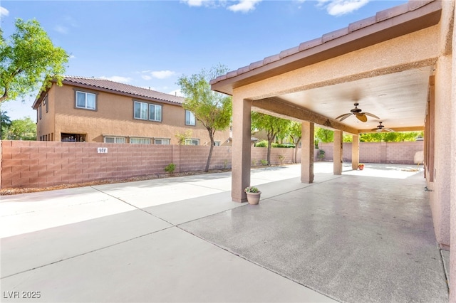 2755 Asgard Ave, Las Vegas, NV 89121 - fenced backyard with ceiling fan and a patio