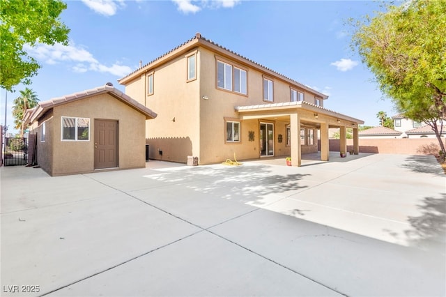 2755 Asgard Ave, Las Vegas, NV 89121 - back of house with a patio, stucco siding, and a tiled roof