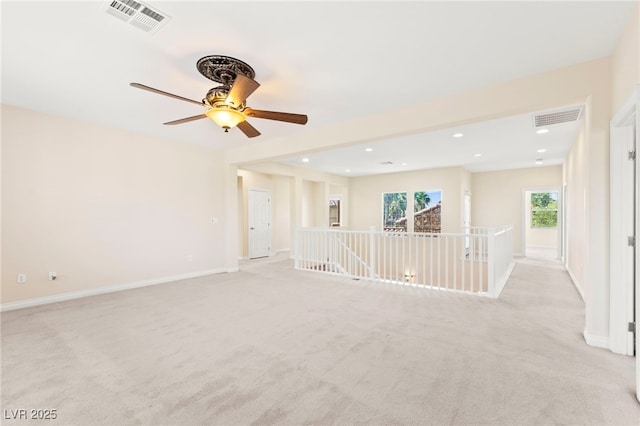 2755 Asgard Ave, Las Vegas, NV 89121 - unfurnished room with light colored carpet, ceiling fan, and recessed lighting