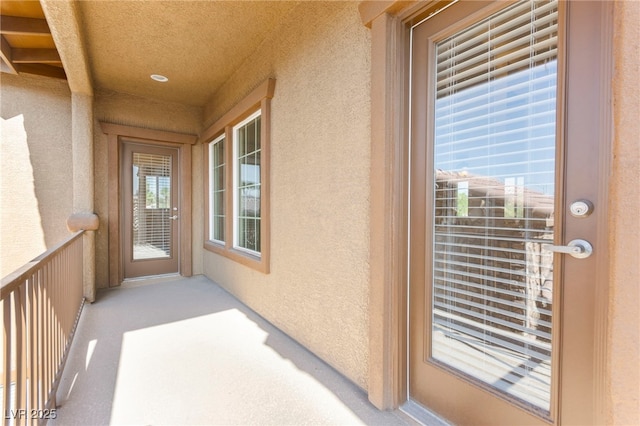 2755 Asgard Ave, Las Vegas, NV 89121 - doorway to property featuring stucco siding and a balcony
