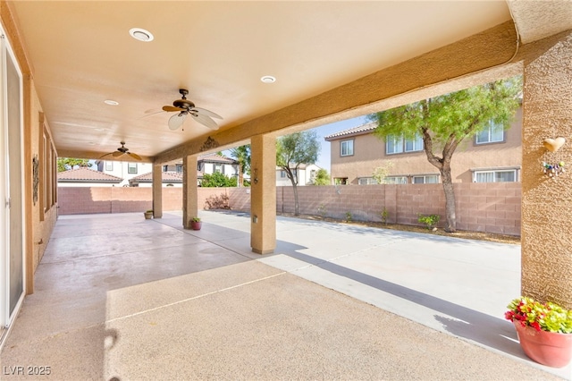2755 Asgard Ave, Las Vegas, NV 89121 - fenced backyard with a ceiling fan and a patio
