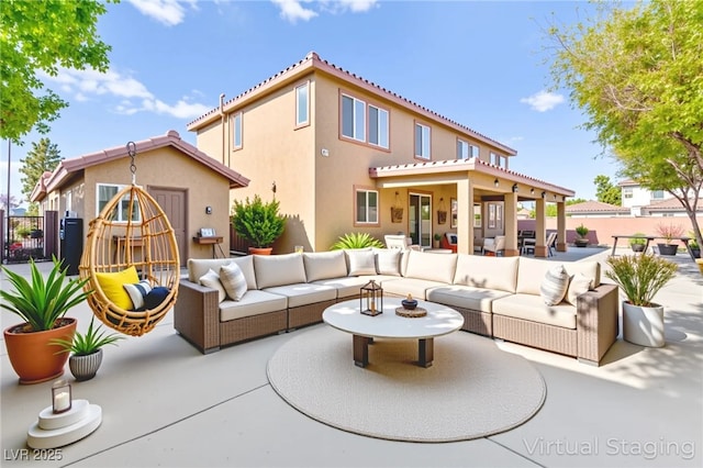 2755 Asgard Ave, Las Vegas, NV 89121 - rear view of house with an outdoor hangout area, stucco siding, and a patio area