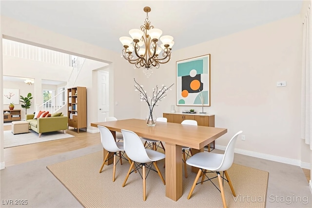 2755 Asgard Ave, Las Vegas, NV 89121 - dining area with a chandelier and baseboards