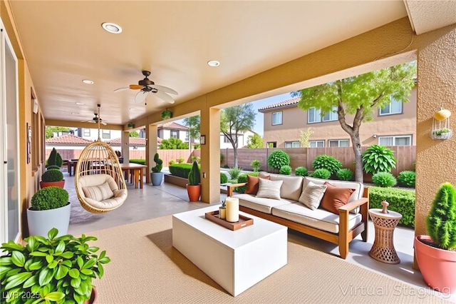 2755 Asgard Ave, Las Vegas, NV 89121 - fenced backyard with an outdoor living space, a patio area, and a ceiling fan
