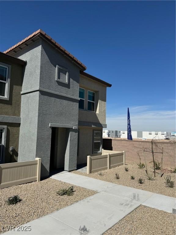 1900 Arietta Vista St, Henderson, NV 89044 - view of side of property featuring stucco siding