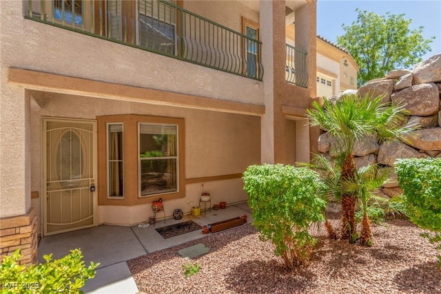 224 Morgyn Ln Unit 6, Boulder City, NV 89005 - property entrance with stucco siding