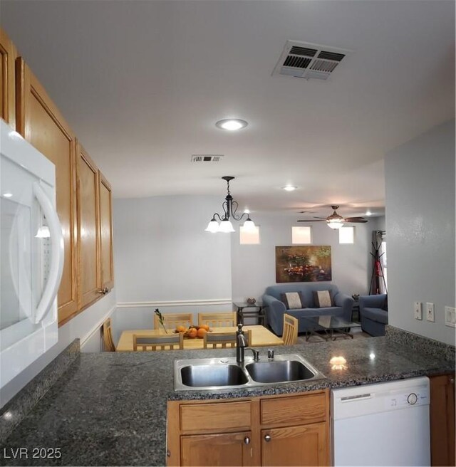 6283 Lapilli Ave, Las Vegas, NV 89139 - kitchen with white appliances, a ceiling fan, open floor plan, decorative light fixtures, and recessed lighting