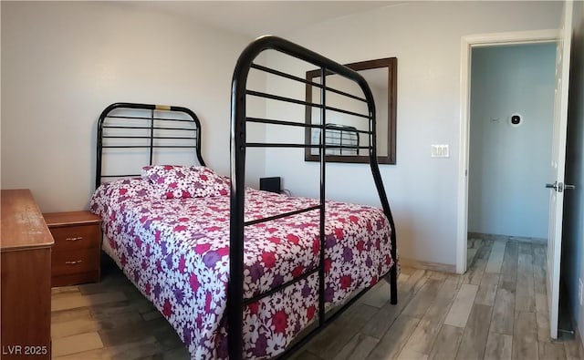 6283 Lapilli Ave, Las Vegas, NV 89139 - bedroom featuring wood finished floors