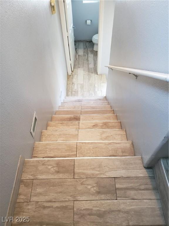 6283 Lapilli Ave, Las Vegas, NV 89139 - stairs with wood finished floors