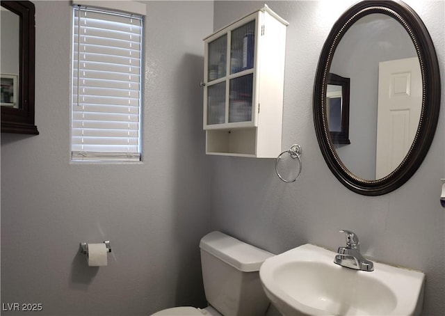 6283 Lapilli Ave, Las Vegas, NV 89139 - bathroom with a sink and toilet