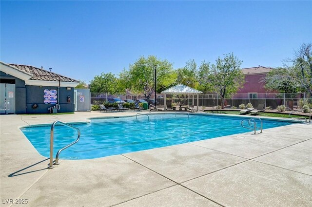 6283 Lapilli Ave, Las Vegas, NV 89139 - community pool with a patio