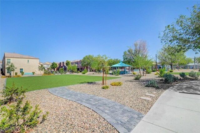 6283 Lapilli Ave, Las Vegas, NV 89139 - view of community with a gazebo, a residential view, and a yard