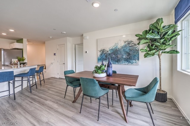 7965 Aurora Sky St Unit 621, North Las Vegas, NV 89084 - dining area with light wood-style flooring, recessed lighting, and plenty of natural light