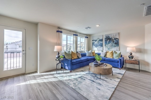 7965 Aurora Sky St Unit 621, North Las Vegas, NV 89084 - living room featuring wood finished floors and baseboards