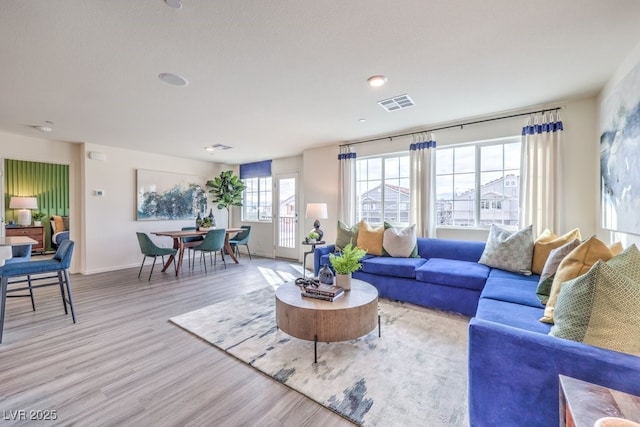 7965 Aurora Sky St Unit 621, North Las Vegas, NV 89084 - living area featuring light wood finished floors and baseboards