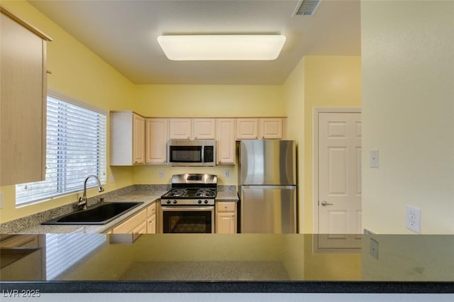 5250 S Rainbow Blvd Unit 2101, Las Vegas, NV 89118 - kitchen featuring appliances with stainless steel finishes and a peninsula