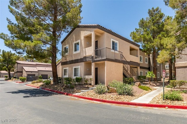 5250 S Rainbow Blvd Unit 2101, Las Vegas, NV 89118 - view of building exterior featuring stairs